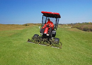 Mowing bomb craters in Holland 