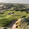 With a green high in the dunes overlooking the North Sea, the eleventh hole is one of three holes on the New course that run directly along the coastline
