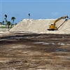 Over 15,000 tons of sand was stockpiled on the seventh fairway for distribution on the front nine to a depth of 8 to 12 inches on the lowest lying stretches of fairway (Photo: Seminole GC)