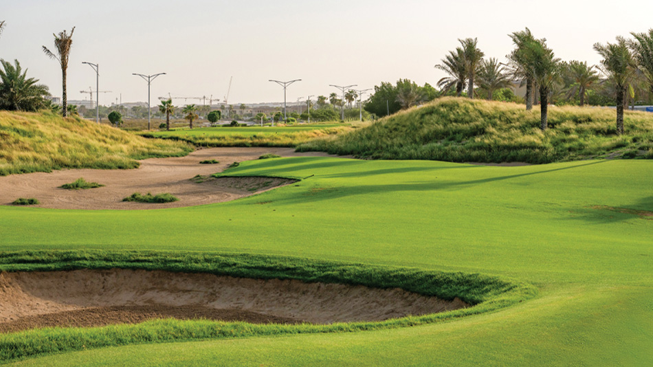 On the new par-three fourteenth, players need to hit over a new dune to an elevated saddle green that slopes to the front and back (Photo: Saadiyat Beach Golf Club)