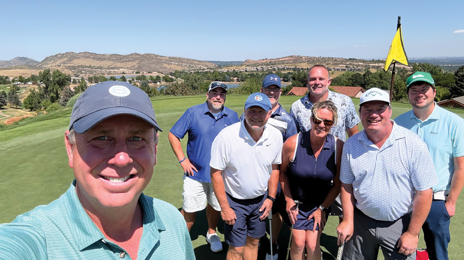 Kevin Atkinson, left, with friends and neighbours at the Red Rock community (Photo: Kevin Atkinson)