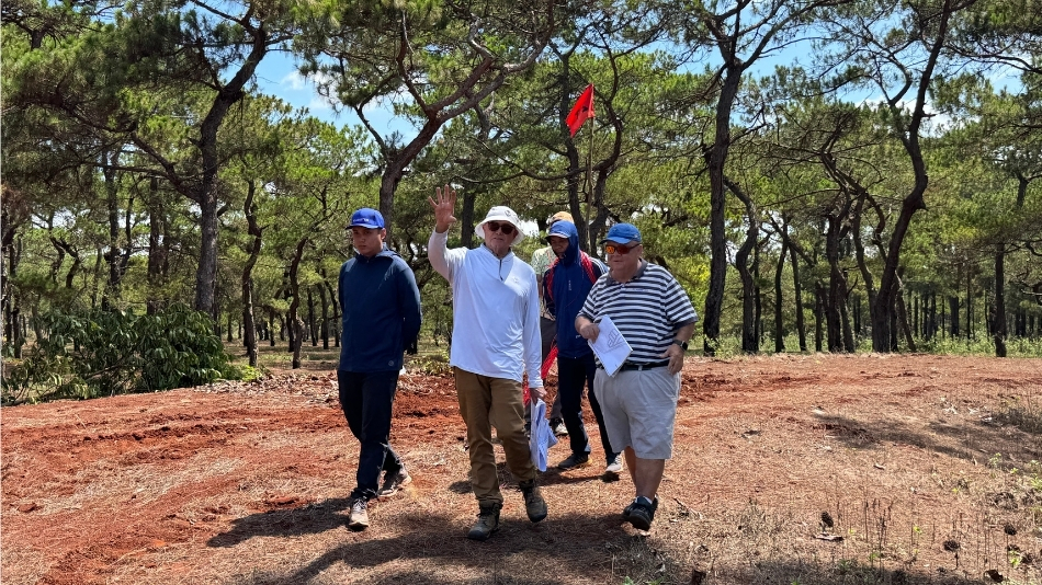 Brian Curley (centre) and Martin Moore (right) of Flagstick survey the site for the new course (Photo: Curley Golf Design)