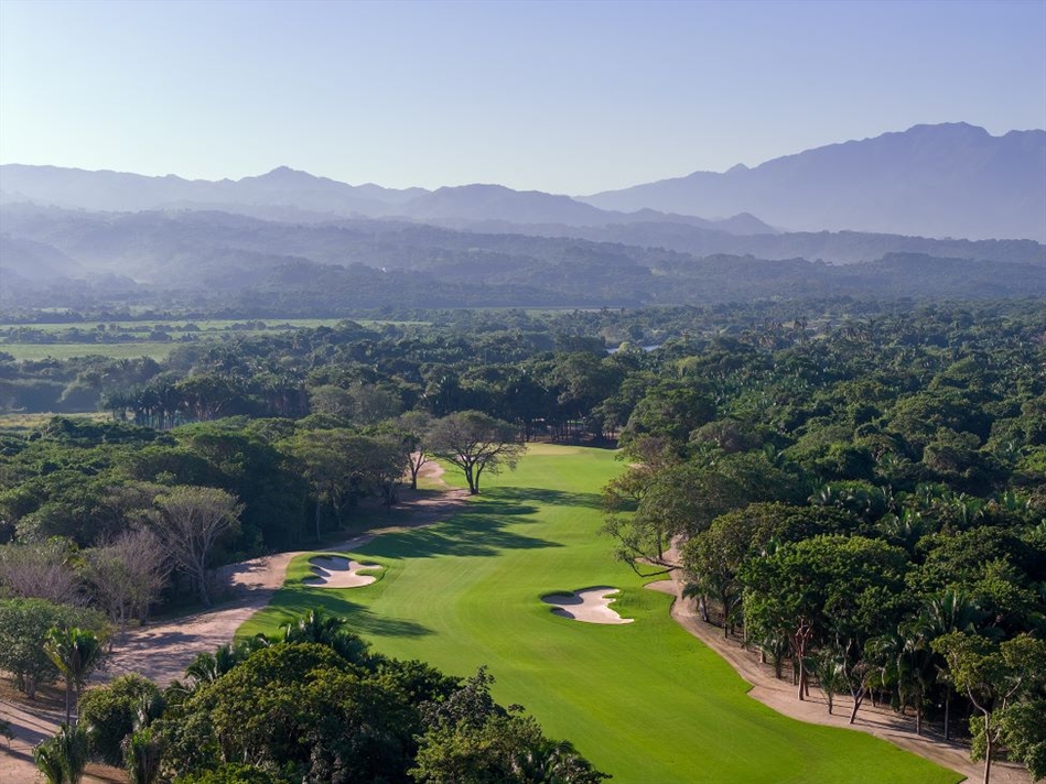 The par 5 seventeenth takes players from the ocean to the jungle