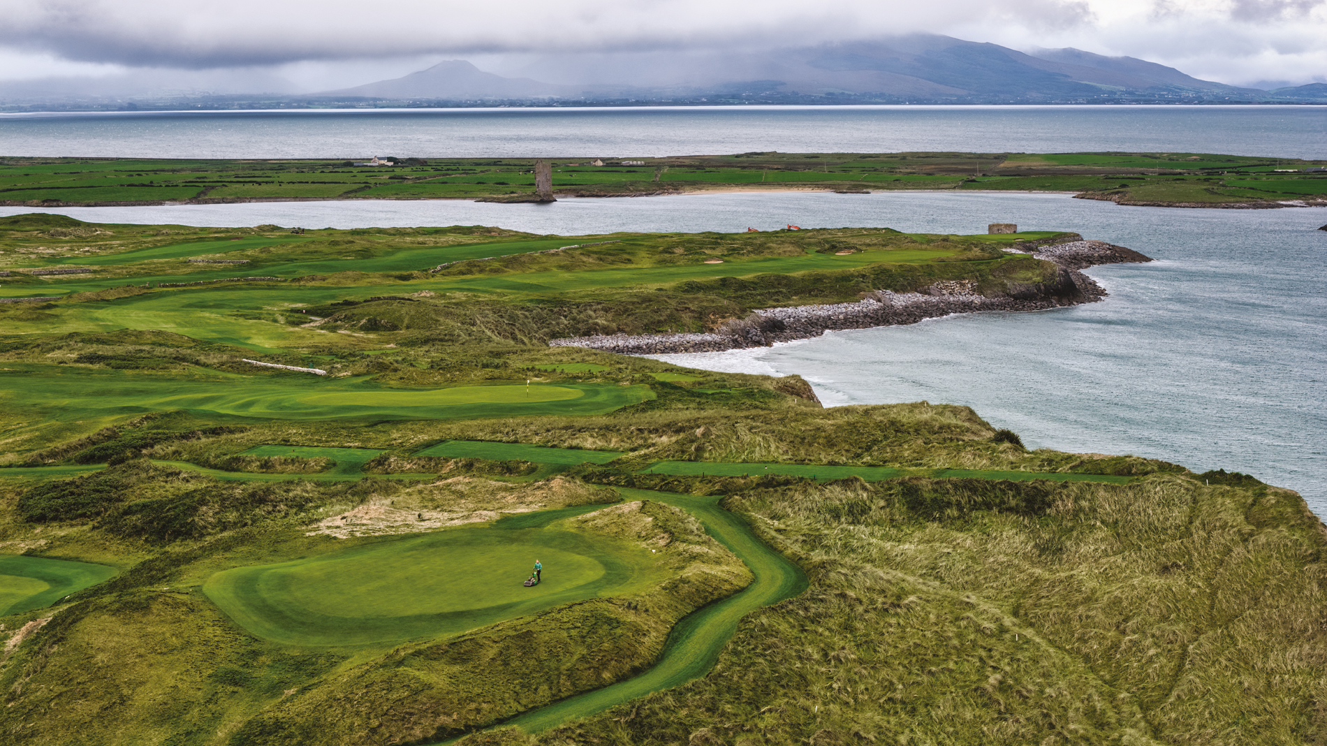 The seventeenth green (foreground), then the first, second and third beyond. The latest work at Tralee has included the accentuation of links characteristics on the front nine (Photo: Ian Cronin)