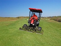 Mowing bomb craters in Holland 
